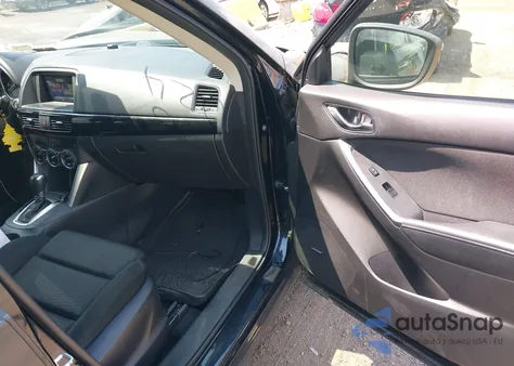 2015 Mazda Cx-5 Touring z USA, uszkodzony, nr VIN JM3KE4CY9F0490361